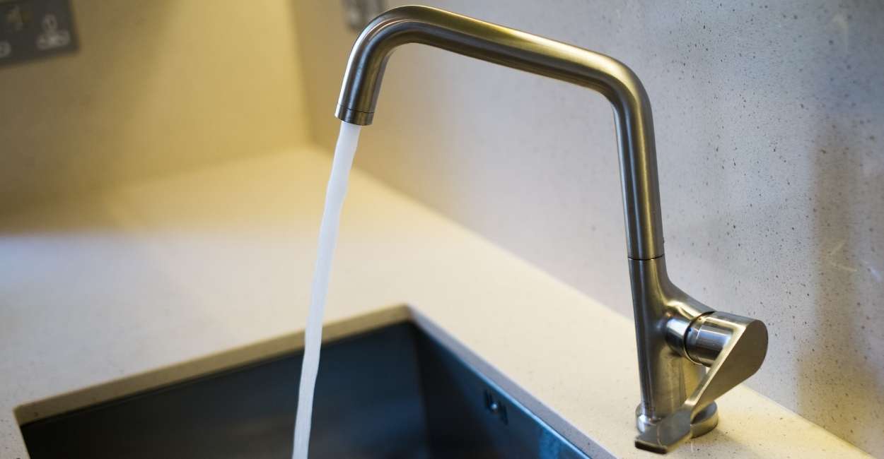 Tap Water Flowing Out Of An Open Tap
